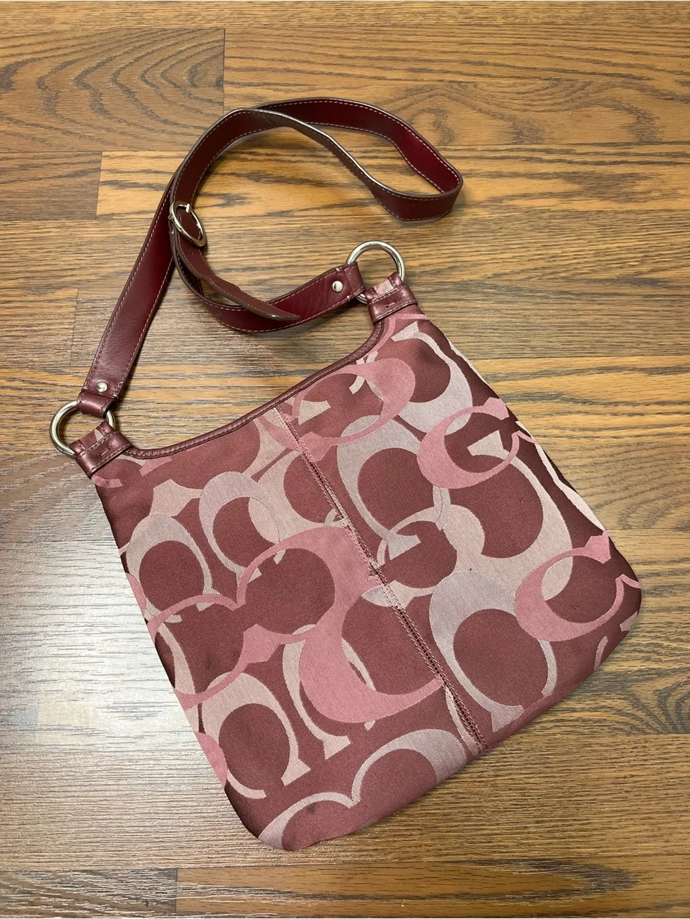 Coach Penelope Optic Signature Hippie Crossbody Bag in a purple/plum color